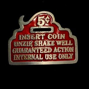 Adult themed belt buckle 1970’s